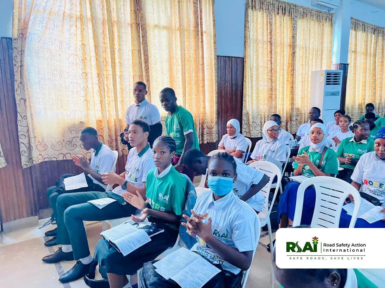 ROYERS members applaud during a youth road safety session.